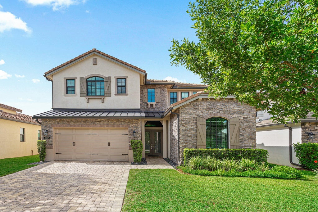 Photo of 8907 Grand Prix Lane, Boynton Beach, FL 33472 (MLS # B26071316)