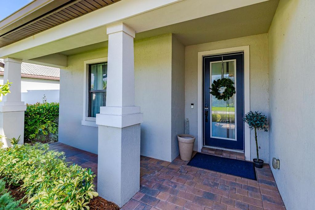 Photo of 719 SE Boboli Way, Port Saint Lucie, FL 34984 (MLS # R11122959)