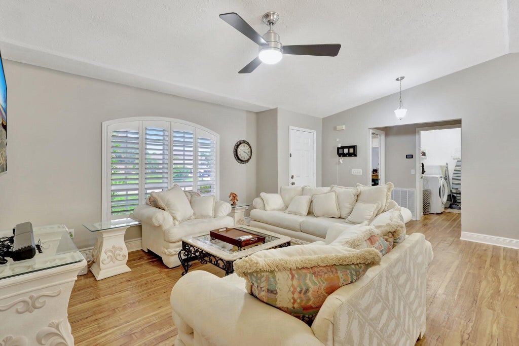 Photo of 1631 SW Norman Lane, Port Saint Lucie, FL 34984 (MLS # R11018238)