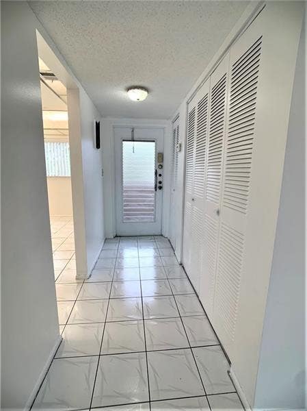 Photo of 8360 Sands Point Boulevard #G210, Tamarac, FL 33321 (MLS # B26060466)