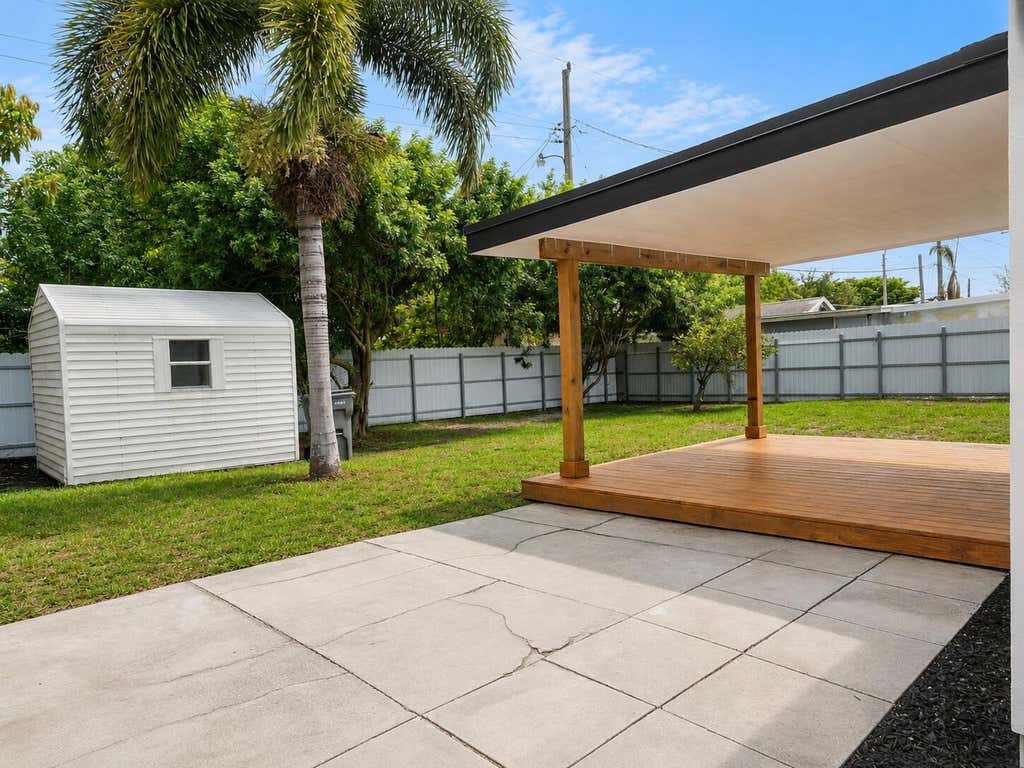 Photo of 2013 LONGWOOD Road, West Palm Beach, FL 33409 (MLS # B26061994)