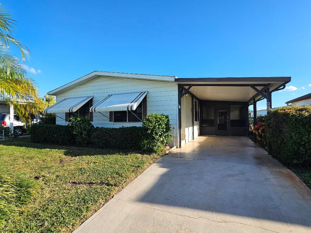 Photo of 6978 SE Delegate Street, Hobe Sound, FL 33455 (MLS # R11141080)