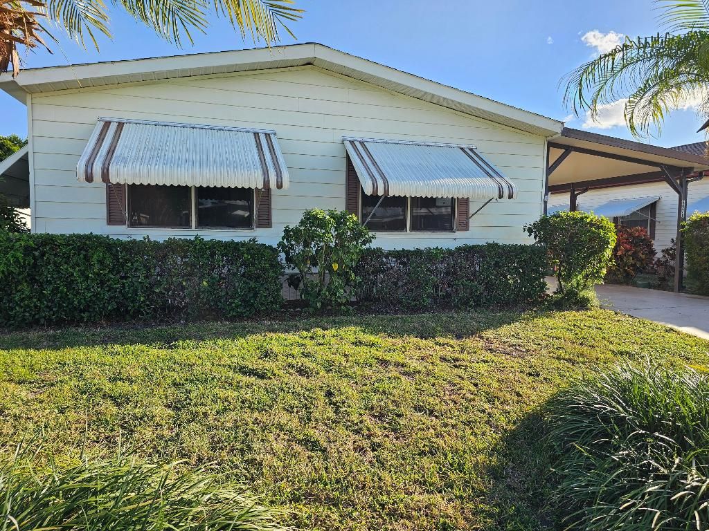 Photo of 6978 SE Delegate Street, Hobe Sound, FL 33455 (MLS # R11141080)