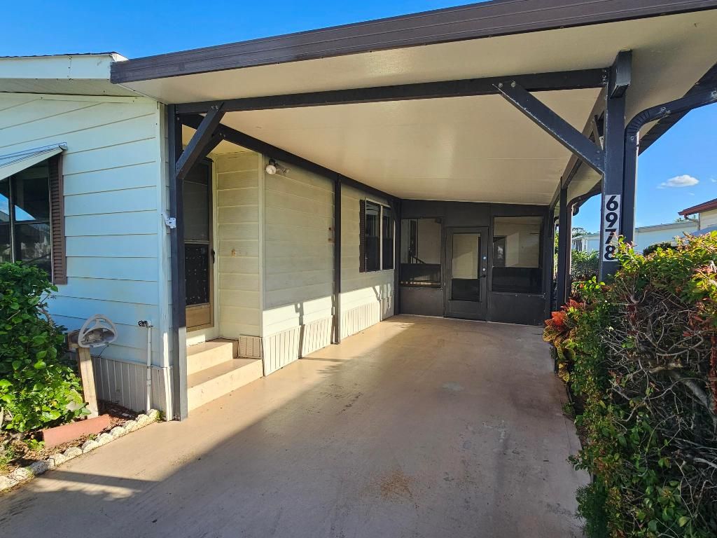 Photo of 6978 SE Delegate Street, Hobe Sound, FL 33455 (MLS # R11141080)