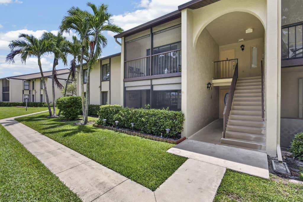 Photo of 820 Sky Pine Way #H2, Greenacres, FL 33415 (MLS # B26063392)