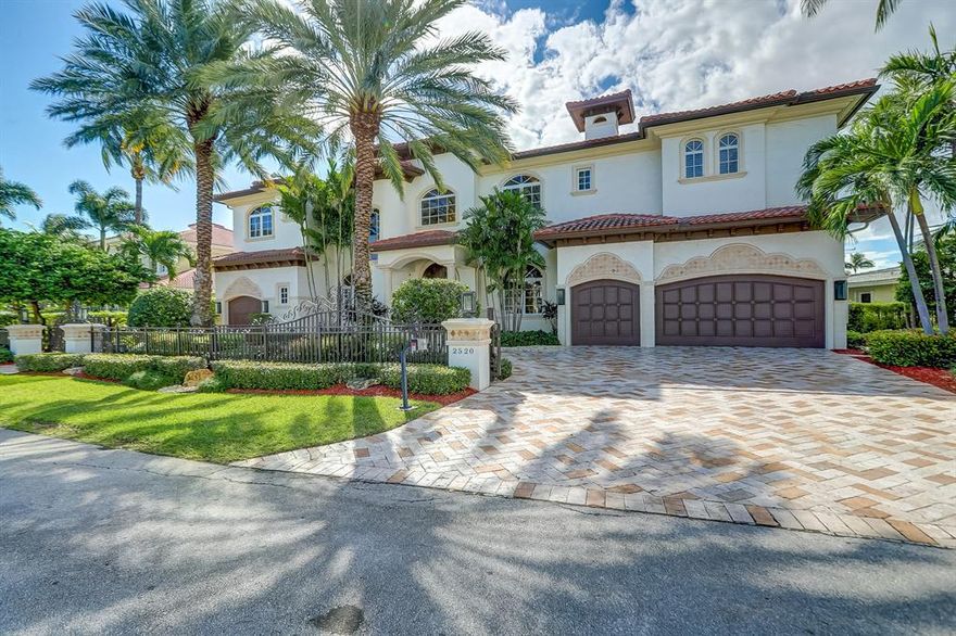 This Elegant Gated Estate Home located on one of Lighthouse Points most prestigious ''Island'' Streets boasts a gracious 6823 sq.ft. under air, with 6 Bedrooms, 7.5 Bathrooms, 4 Car Garage.  Expansive Water Views of the Wide Canal from almost every room! Enjoy the oversized south facing patios and balconies, a Luxury Heated Pool with large sun shelf and a jetted spa, outdoor kitchen with dining area and plenty of room for lounging.  Just a few minutes to the Hillsboro Inlet by boat, this home has an 82' Deep Water Dock, a 30,000 lb, SE Custom Boat Lift, including a commercial ice maker, perfect for the serious fisherman.  This estate home is perfect for a family and for entertaining.