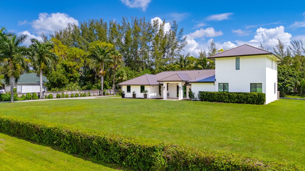 Photo of 13333 77th Place N, West Palm Beach, FL 33412 (MLS # R11102967)