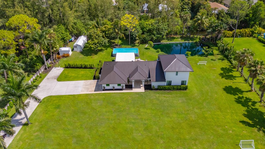 Photo of 13333 77th Place N, West Palm Beach, FL 33412 (MLS # R11102967)