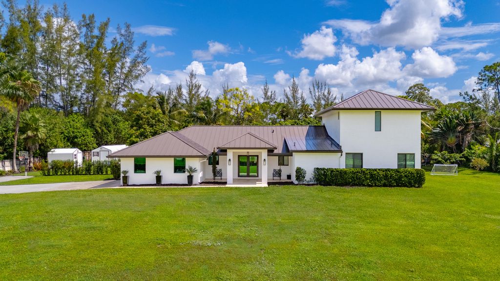 Photo of 13333 77th Place N, West Palm Beach, FL 33412 (MLS # R11102967)