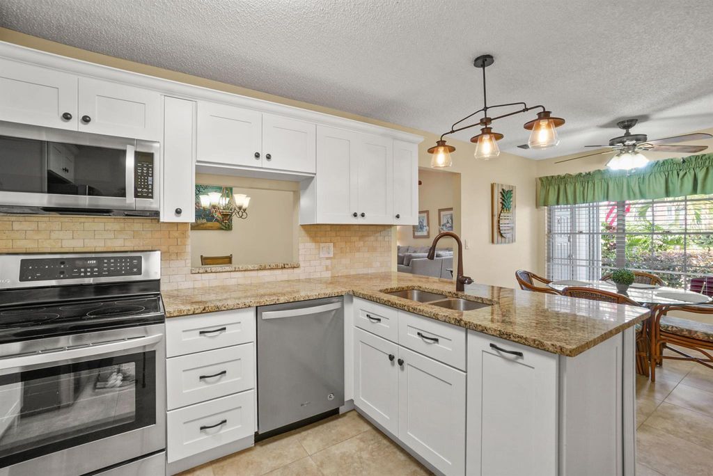 Photo of 1528 Ocean Dunes Circle, Jupiter, FL 33477 (MLS # R10954936)