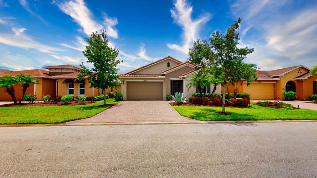 Photo of 10230 SW Fernwood Avenue, Port Saint Lucie, FL 34987 (MLS # R10997296)