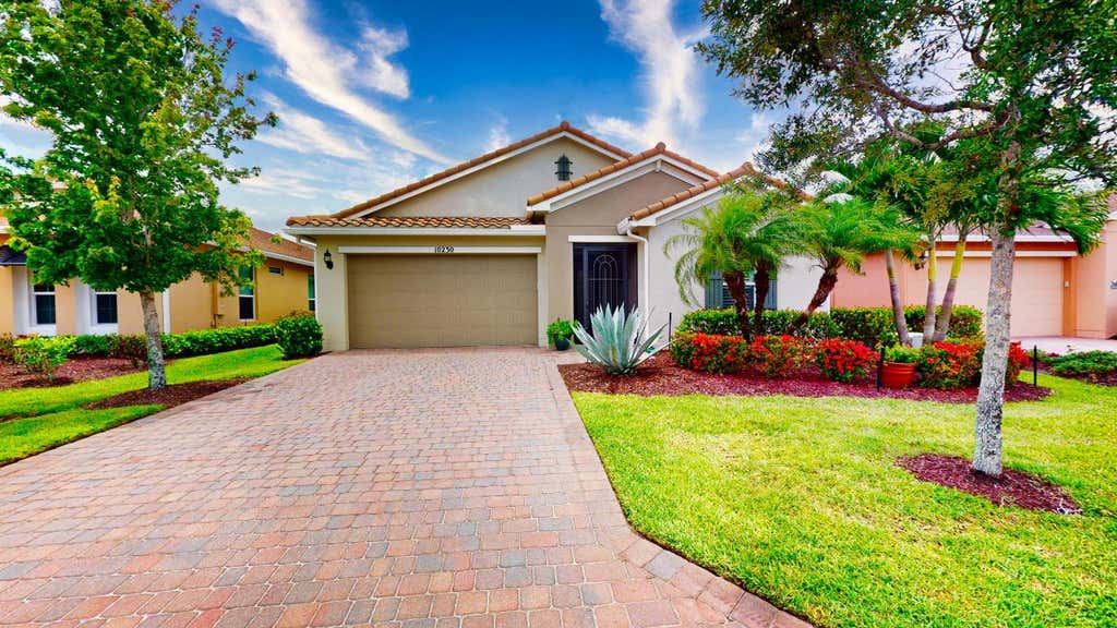 Photo of 10230 SW Fernwood Avenue, Port Saint Lucie, FL 34987 (MLS # R10997296)