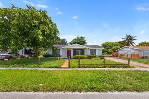 Photo of 2251 E Avenue H, Riviera Beach, FL 33404 (MLS # R11109594)