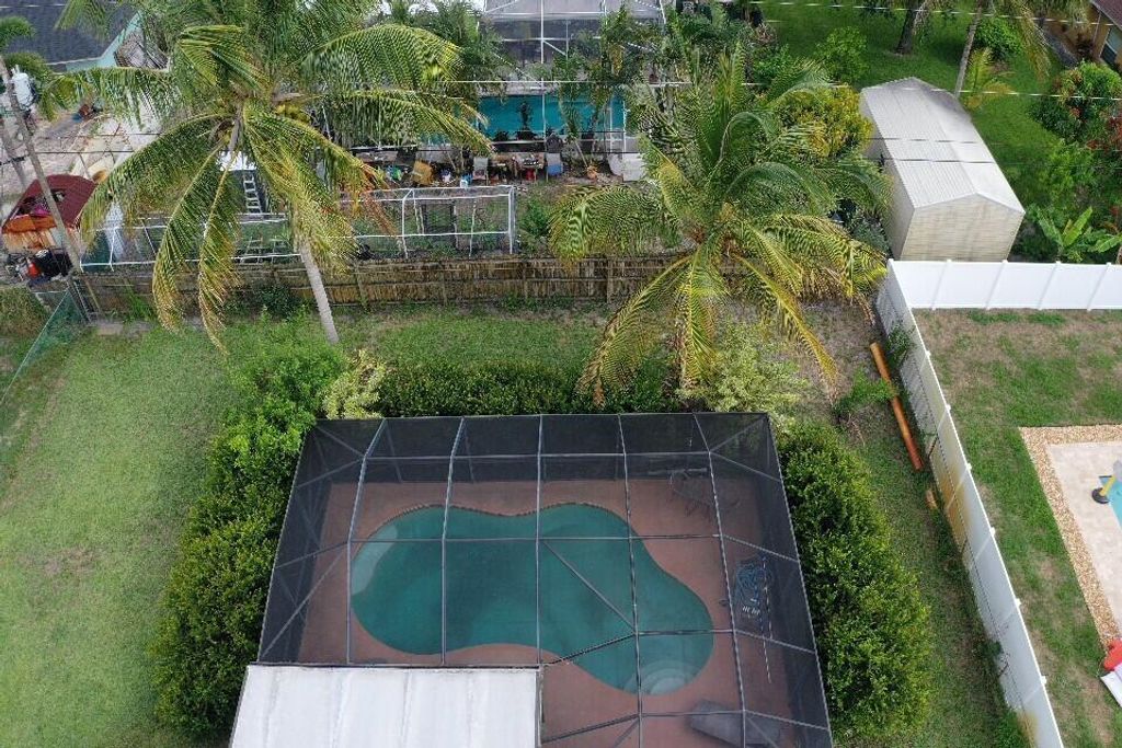 Photo of 1354 SW Axtell Avenue, Port Saint Lucie, FL 34953 (MLS # R10998189)