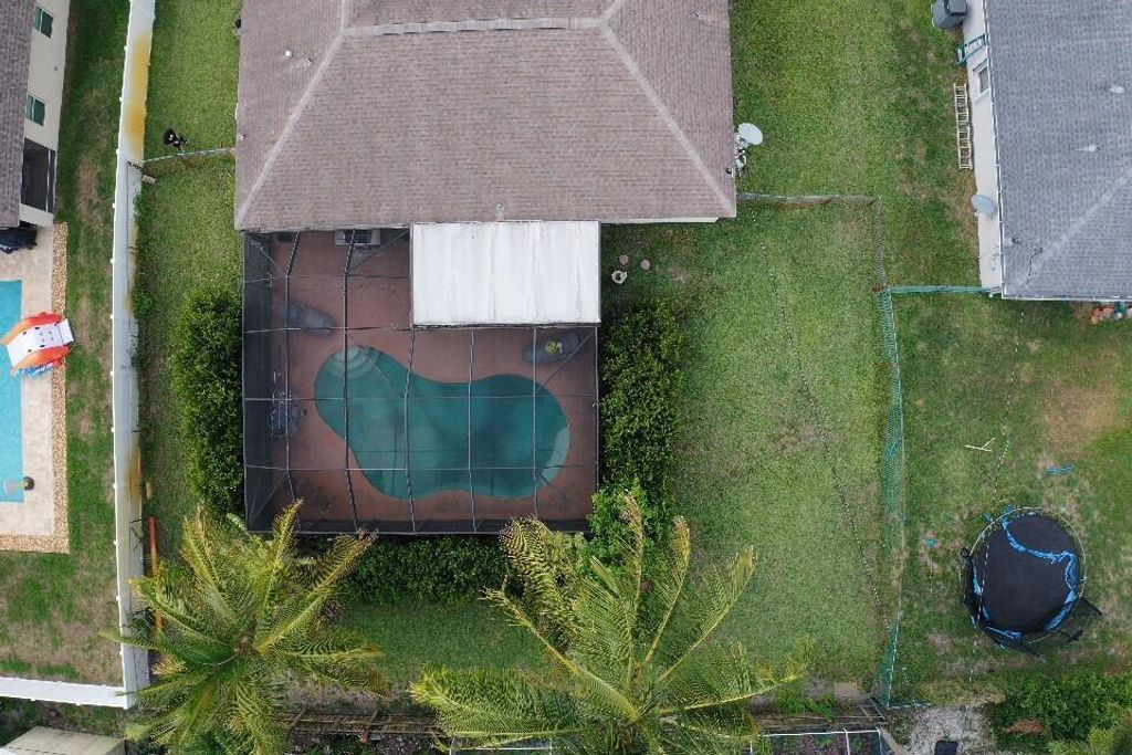 Photo of 1354 SW Axtell Avenue, Port Saint Lucie, FL 34953 (MLS # R10998189)