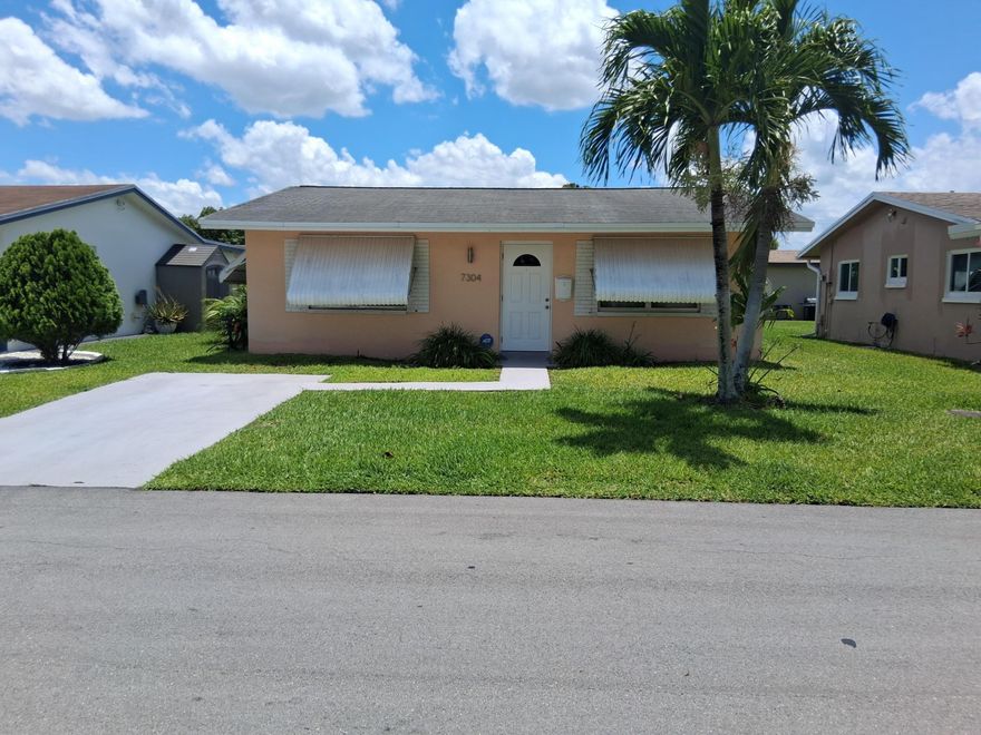 New to the market, schedule your tour today before its under contract. Beautiful all ages neighborhood Mainlands 9, offer this single family 2-bedroom 1 bathroom home ready for new owner. Low HOA includes lawn and sprinkler service along with community pool, playground and fitness area.  Nice outdoor patio and back yard, perfect for relaxing weekends.  Don't miss out on this one.