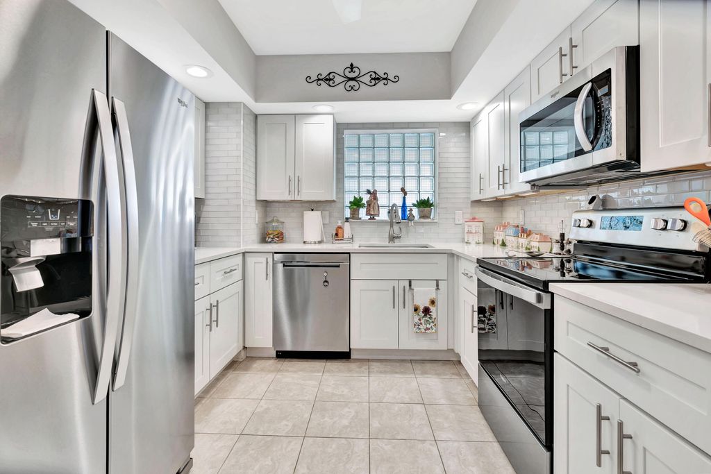 Photo of 11571 Winchester Drive #27 D, Palm Beach Gardens, FL 33410 (MLS # R11157253)