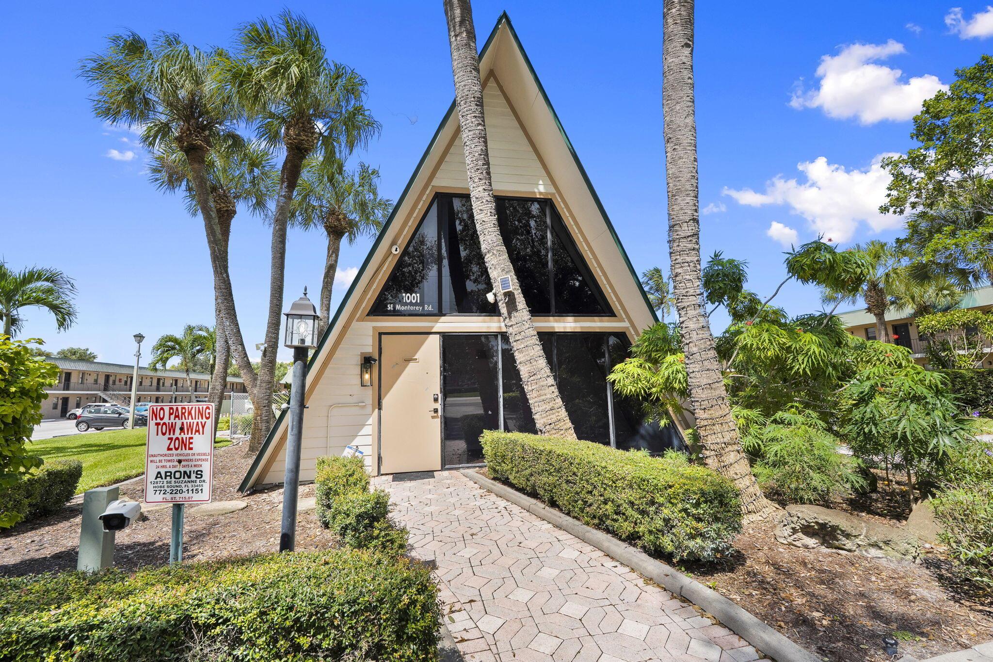 ABSOLUTE AUCTION SELLING TO THE HIGHEST BIDDER REGARDLESS OF PRICE - AUCTION NOVEMBER 22, 2025, AT 10:00 AM! This free-standing mixed-use A-frame office condo offers an ideal live and work setup, featuring a reception area, kitchenette, bath, and approximately 1,100 square feet including upper-level offices or bedrooms. The space includes two parking spots, new flooring, and a new central A/C system. It is conveniently located near US-1 and Kanner Highway at 1001 SE Monterey Road in Stuart, Florida.