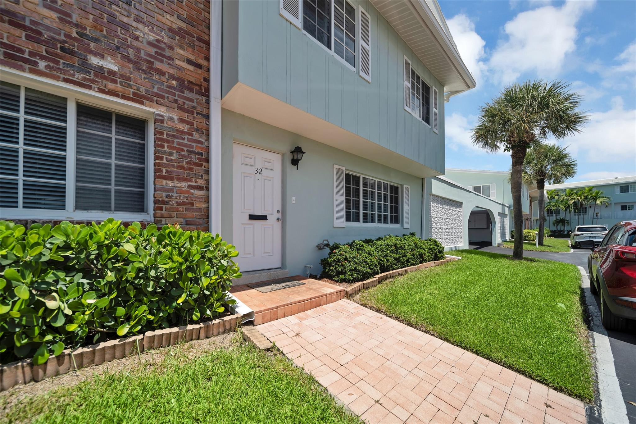 This beautifully appointed 3-bedroom, 2.5-bath townhome is just steps from the beach, located in the distinctive Sea Ranch Villas. Here, you won't have to worry about the additional costs and stipulations associated with living in a high-rise building. The townhome features several updates, including a spacious primary suite with a cozy sitting area, along with two additional bedrooms, creating the ambiance of an oceanside vacation home. Conveniently situated near shopping, restaurants, and nightlife, you’ll have easy access to these amenities within a short distance.