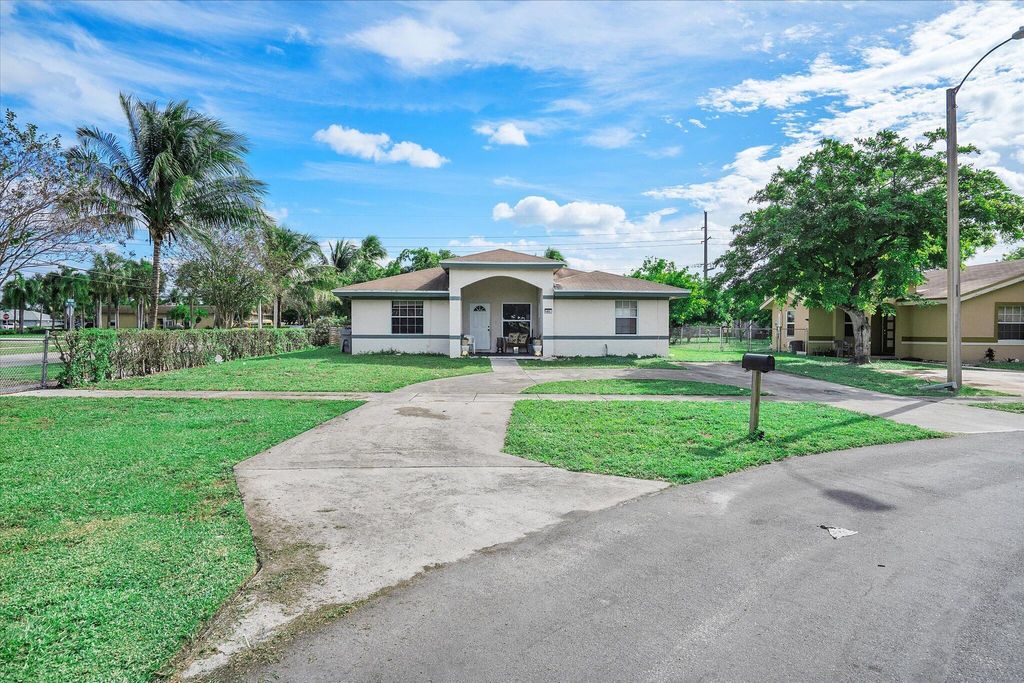 Photo of 1460 NW 3rd Terrace, Pompano Beach, FL 33060 (MLS # R11138209)