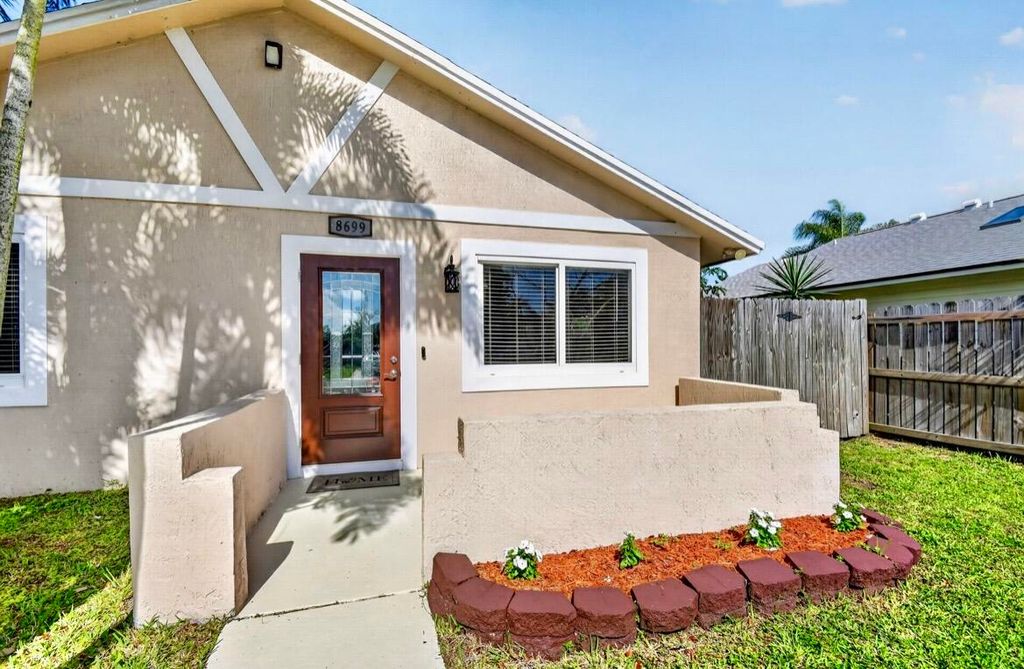 Photo of 8699 Uranus Terrace, West Palm Beach, FL 33403 (MLS # B26017525)