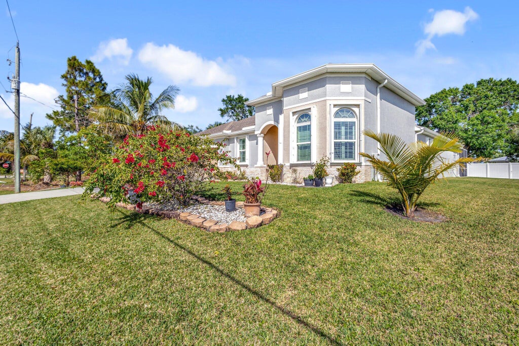 Photo of 2621 SW Feather Terrace, Port Saint Lucie, FL 34953 (MLS # B26073109)