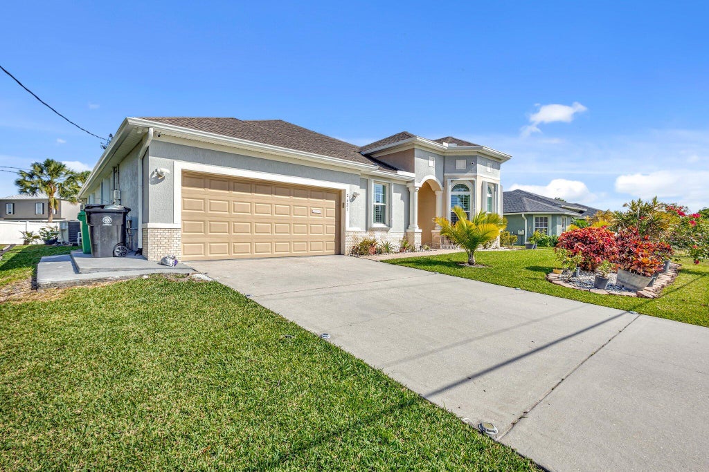 Photo of 2621 SW Feather Terrace, Port Saint Lucie, FL 34953 (MLS # B26073109)