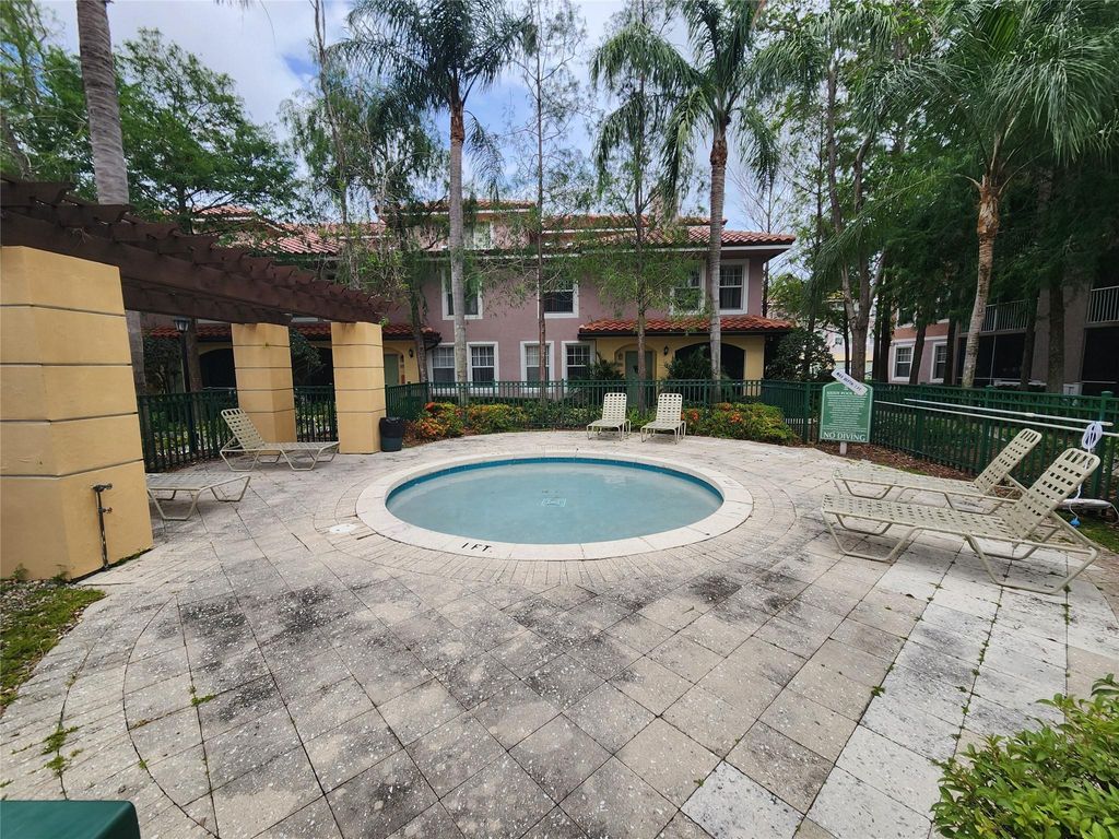 Photo of 6778 W Sample Road #6778, Pompano Beach, FL 33067 (MLS # F10451071)