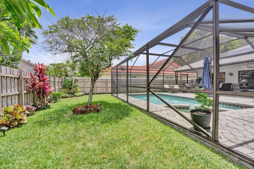 Photo of 5147 NW 59th Way, Coral Springs, FL 33067 (MLS # B26034834)