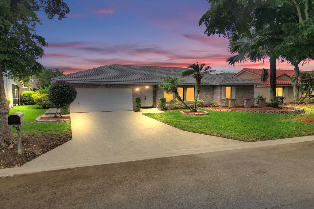 Photo of 5147 NW 59th Way, Coral Springs, FL 33067 (MLS # B26034834)