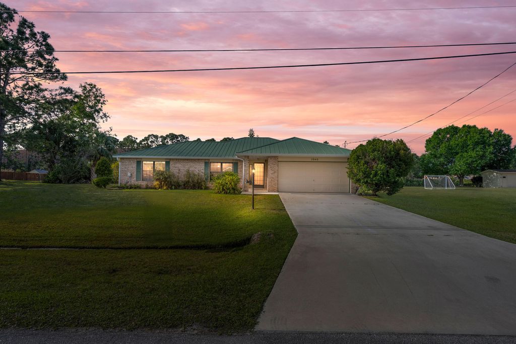 Photo of 5940 NW Brenda Circle, Port Saint Lucie, FL 34986 (MLS # R11115712)