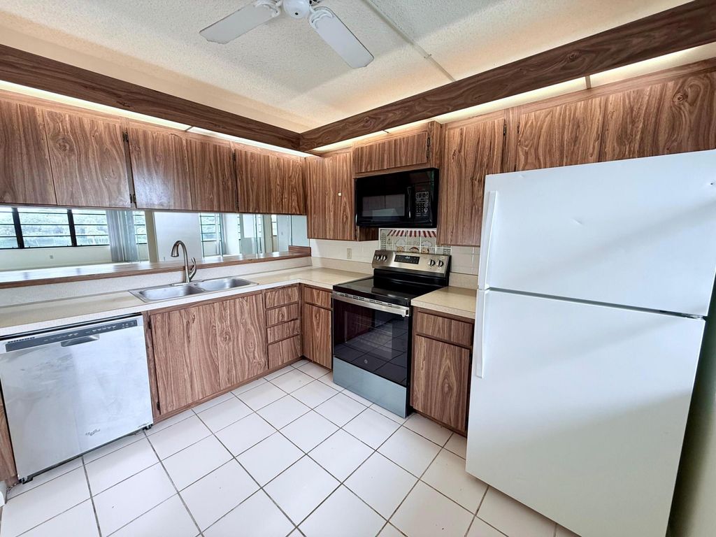 Photo of 3525 Village Boulevard #Unit 401, West Palm Beach, FL 33409 (MLS # B26011876)
