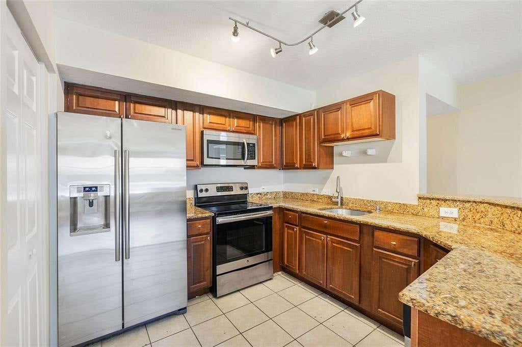 Photo of 101 Villa Cir Cir #101, Boynton Beach, FL 33435 (MLS # F10337526)