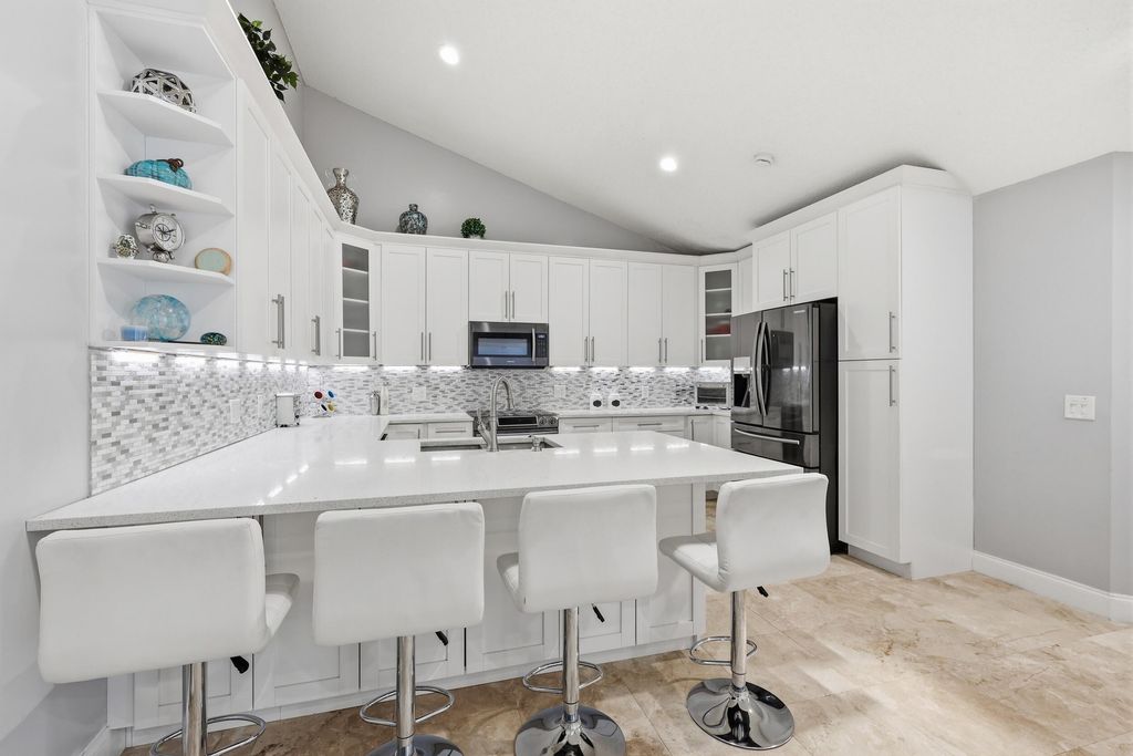 Photo of 5460 Eagle Lake Drive #72b, Palm Beach Gardens, FL 33418 (MLS # B26006780)