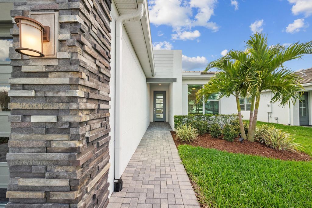 Photo of 10282 SW Corvus Lane, Port Saint Lucie, FL 34987 (MLS # R11065636)