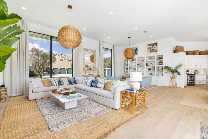 Fully turn-key direct taxiway Aero Club home located just one lot from the runway. Completed in 2026, this meticulously renovated 5 Bedroom | 3.5Bath | 2 Car Garage estate offers over 3,500 +/- square feet of thoughtfully designed living space that flows effortlessly between indoors and out ideal for families and those who love to entertain. Every detail of this designer-decorated home was done right. The home features a like-new roof, full hurricane impact windows and doors, and fresh marble decking surrounding a resurfaced pool with covered seating areas. Inside, the sun-soaked chef's kitchen is anchored by quartzite countertops, with new flooring, electrical, and plumbing carried throughout the entire home. Every room was individually curated and nothing was an afterthought. The smart split floorplan keeps guest rooms comfortably separate from the primary suite. Tucked just off the living room, a private bedroom with its own full bath makes for a perfect VIP guest suite. Whether you're hosting family, friends, or out-of-town visitors, the layout just works.

This property is available fully furnished and turn-key for an additional fee. Move right in without the headache of furniture lead times or sourcing a single throw pillow. Additionally, there is ample room for a hangar to be built perfect for airplane storage, RV or car collection. 

The Aero Club is a private aeronautical community built around a 4,000-foot paved and lighted runway, jet-approved up to 12,500 lbs. That said, you don't need wings to love it here. The community draws residents from all walks of life. Minutes from the equestrian showgrounds, Wellington Landings Middle School, Binks Forest Elementary, Wellington High School, and some of the area's best shopping and dining. Schedule a showing today!