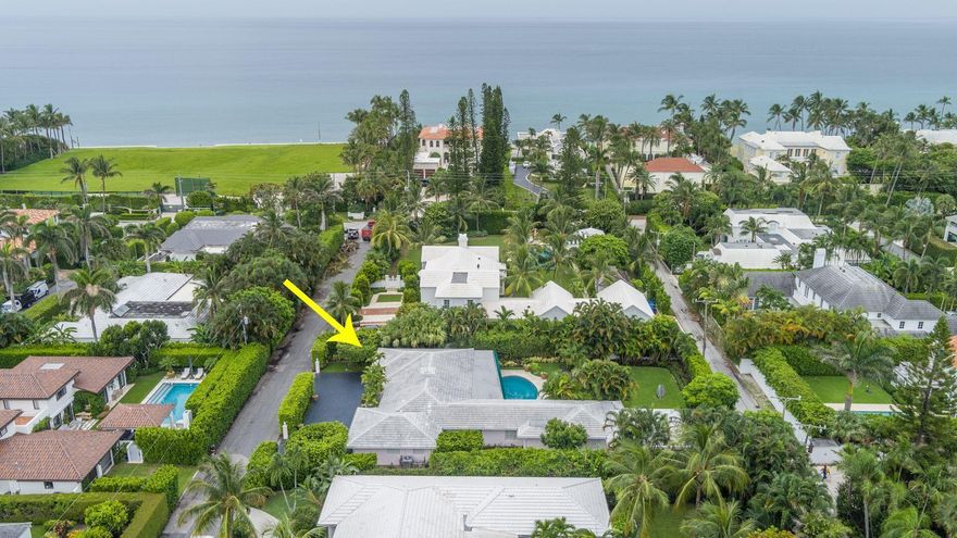 Substantial 16,474 sf property on a prominent north end street with beach access & direct lake trail access. A lovingly-maintained 4 bedroom, 4.5 bathroom home with pool, and rear two-car garage with a private lane for access.