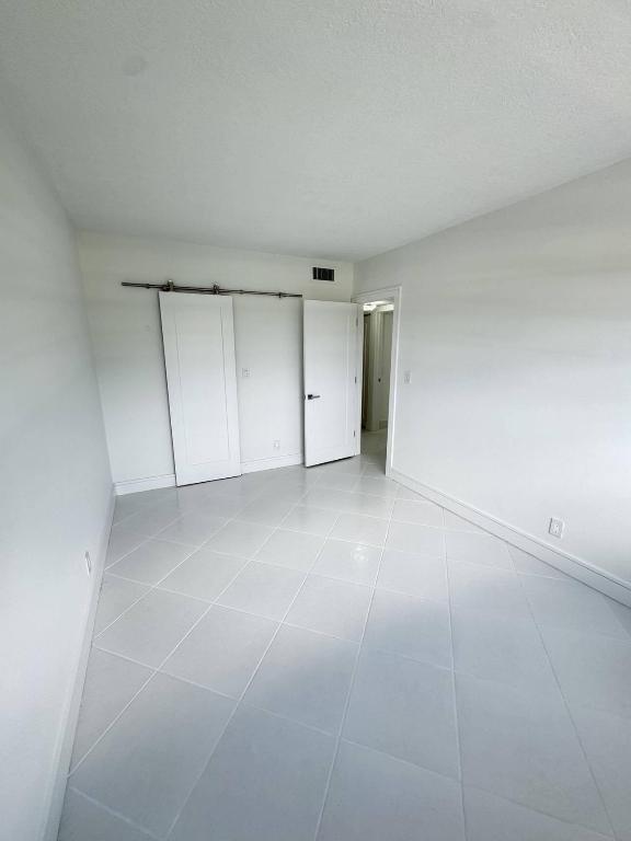 BOCA ROYAL APTS CONDO - Residential Lease