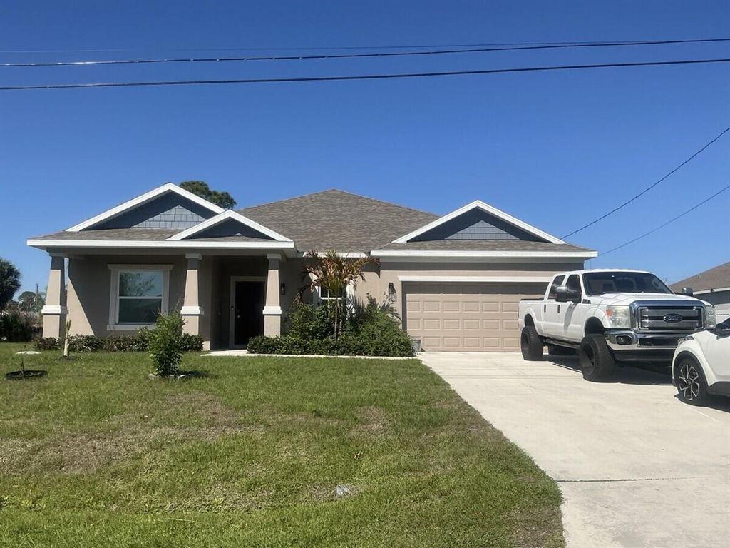 Photo of 3982 SW Halcomb Street, Port Saint Lucie, FL 34953 (MLS # B26031294)