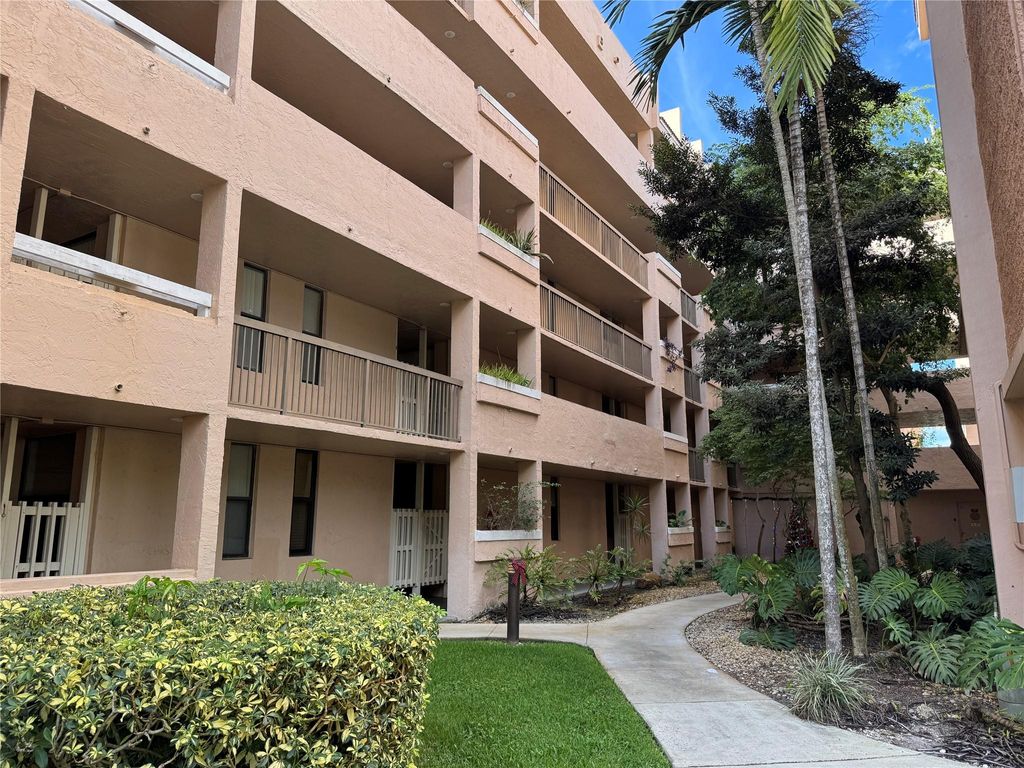 Photo of 6800 Cypress Rd #102, Plantation, FL 33317 (MLS # F10538969)
