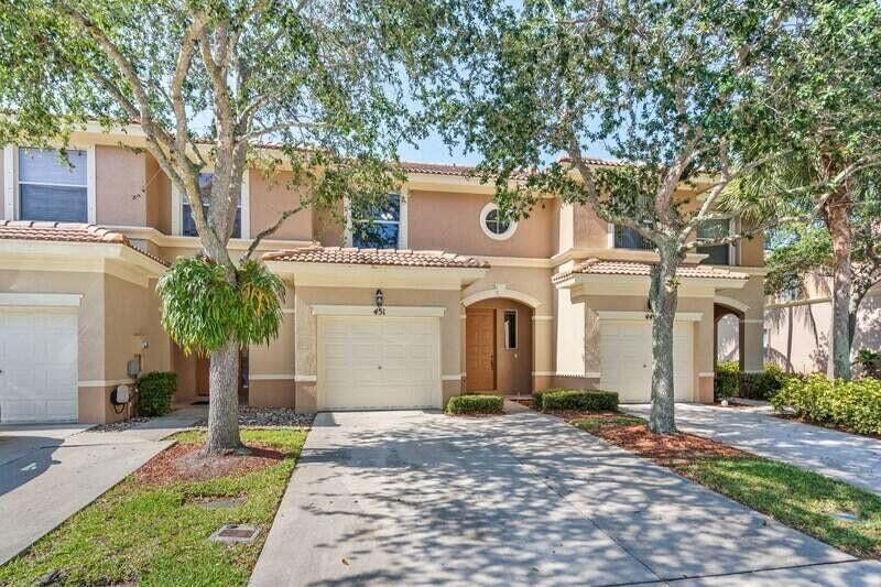 Spacious 2 Br 2.5 Bath townhome in a Great Community . Walking distance COSTCO Plaza with all other restaurants and shops, water park, ball fields, and a community pool.The House offers laminate wood flooring and tile. Plenty of storage and closets, washer and dryer inside, Large master bedroom with walk in closets. One car garage, open patio, and shutters.Brand new refrigerator ,Washer and Dryer.