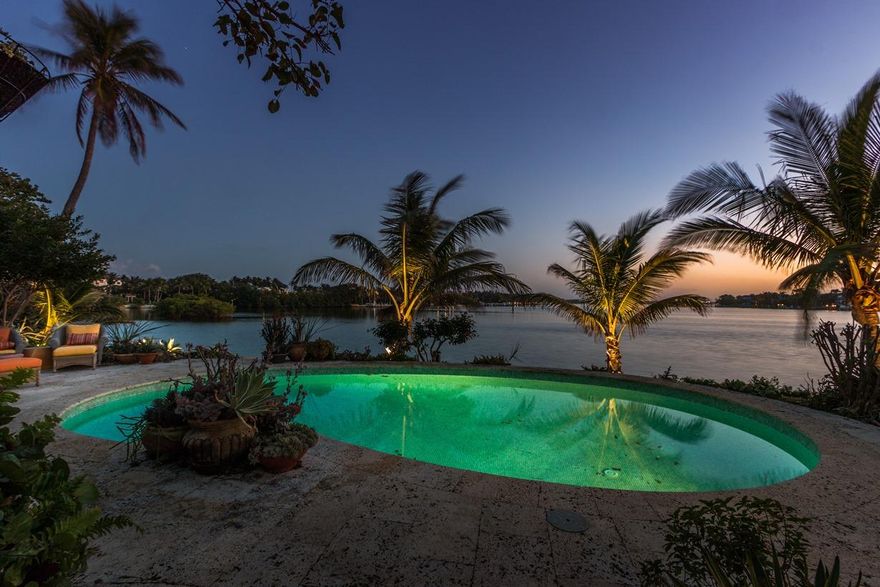 Sweeping water views from this custom home at the tip of Point Manalapan.  This spectacular 1 story home was custom built by renowned architect Henry Harding, updated by the current owner, famed designer Renny Reynolds, and appeared as the cover feature in the June issue of Elle Decor in 2008.  It has been updated while still retaining the feel and look of the homes that made living in this upscale community truly special. Built on more than half an acre at the very point of Manalapan, this home can be your tropical oasis, surrounded by lush gardens, mature landscaping and panoramic views of the waters surrounding Point Manalapan. If privacy and security are as important to you as luxurious living in a custom home, you'll love being part of a town of only 350 residences, and the warmth and friendliness of neighbors who share your desires for only the best life has to offer.

Manalapan home ownership and residency comes with a gratis membership to the La Coquille Club, a cherished part of the Manalapan experience. Members are granted access to the club's many amenities, including pool, spa, private beach, tennis, golf, a business center, fitness and club room. Members are not charged initiation or fees and are billed only for the goods and services enjoyed while at the club. 

Located just 20-minutes from both the heart of Palm Beach and world class shopping along Worth Avenue, is the exclusive seaside town of Manalapan. Rated by Forbes as the most elite zip code for multi-million dollar waterfront homes in America, Manalapan offers gorgeous sandy beaches, turquoise waters, and unique amenities including membership at the very exclusive La Coquille Club at the Eau Spa Hotel. For the discriminating home buyer, this fabulous lifestyle is available at a fraction of the cost of comparable home ownership in Palm Beach. With 192 of Manalapan's 200 luxurious homes providing direct water access for boaters, this extremely private, secure and very exclusive island location is the best value among south Florida's million dollar plus upscale living communities.