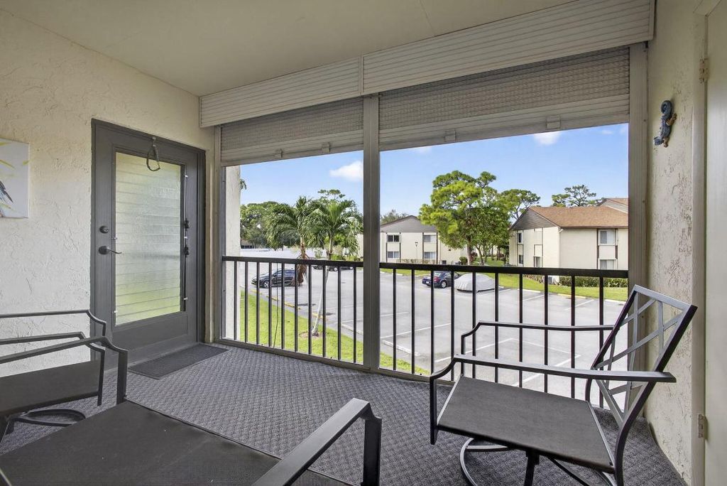 Photo of 5960 Whispering Pine Way #A-2, Greenacres, FL 33463 (MLS # R11138519)