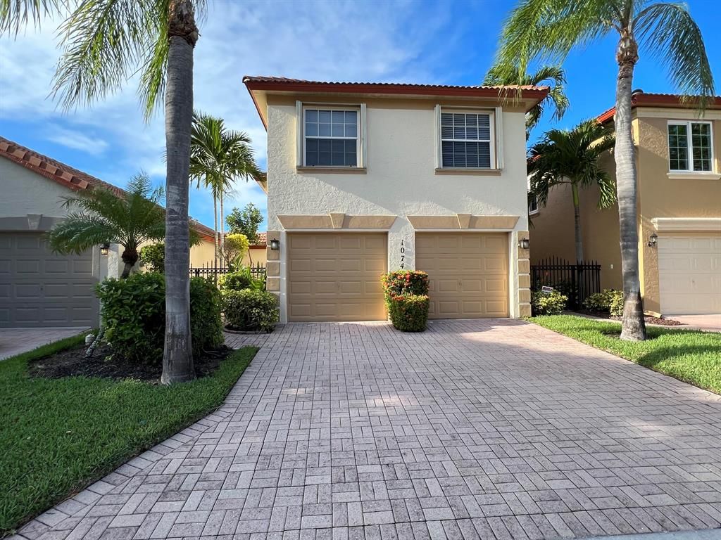 Photo of 1074 Via Jardin, Palm Beach Gardens, FL 33418 (MLS # R10827817)