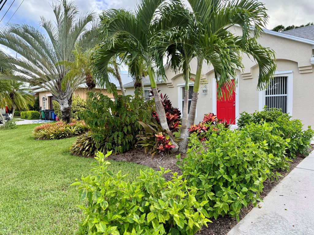 Photo of 5890 NW Dowse Street, Port Saint Lucie, FL 34986 (MLS # R11125604)