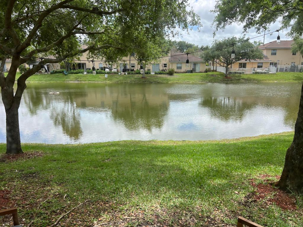 Photo of 8936 NW 53rd Court, Sunrise, FL 33351 (MLS # B26014194)