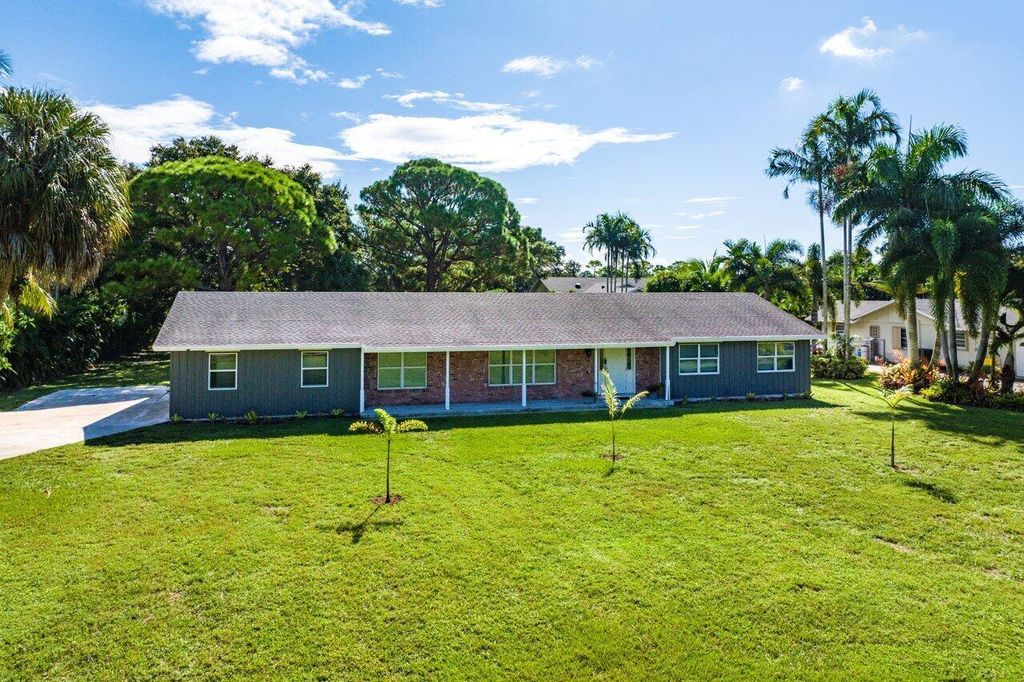 Photo of 11144 Monet Woods Road, Palm Beach Gardens, FL 33410 (MLS # R11022724)