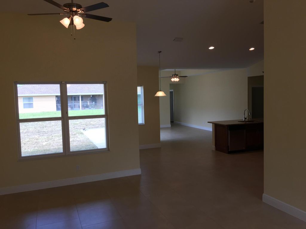 Photo of 5866 NW Mesa Circle, Port Saint Lucie, FL 34986 (MLS # B26029667)