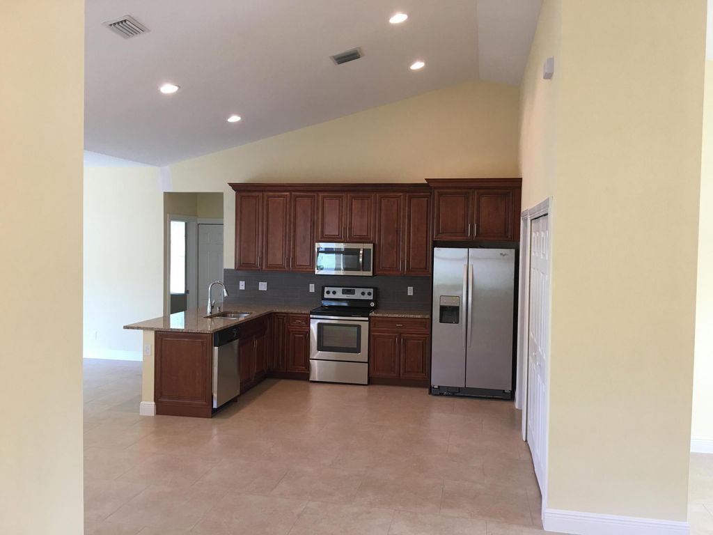 Photo of 5866 NW Mesa Circle, Port Saint Lucie, FL 34986 (MLS # B26029667)