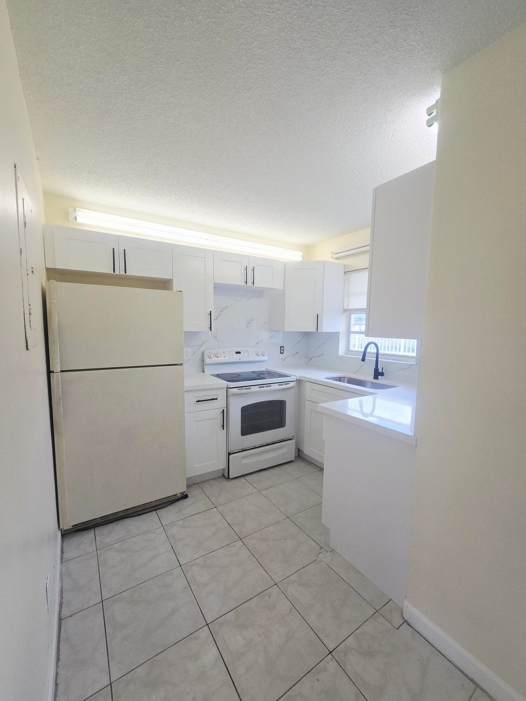 Photo of 3196 49th Lane S, Lake Worth Beach, FL 33461 (MLS # B26006420)